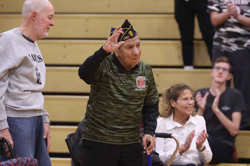 World War II veteran Joe Belman is introduced at the Lockport Township High School 10th Annual Veterans Night Celebration on Friday, Dec. 6, 2024.