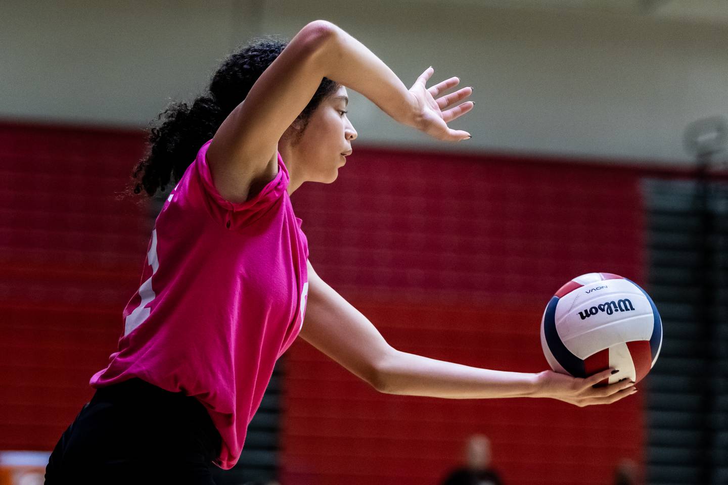 Bolingbrook's Angelia Robinson serves during a varsity volleyball game against Joliet West at Bolingbrook on Oct. 16, 2025.