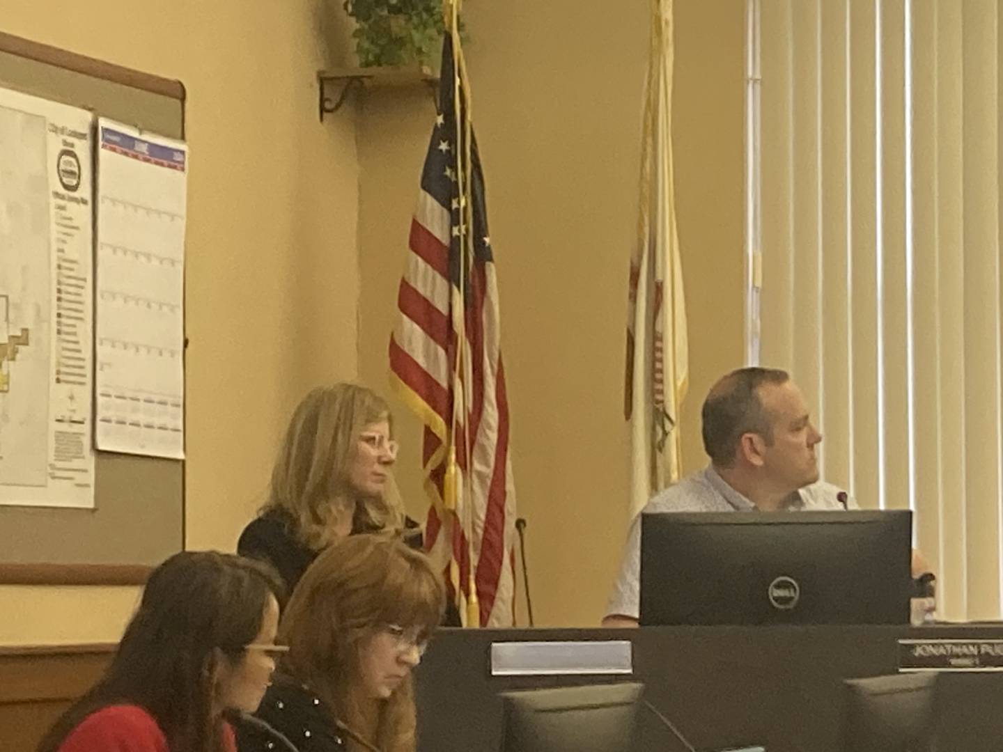 Susan King takes her seat at the Lockport City Council dais after being sworn in on June 5.