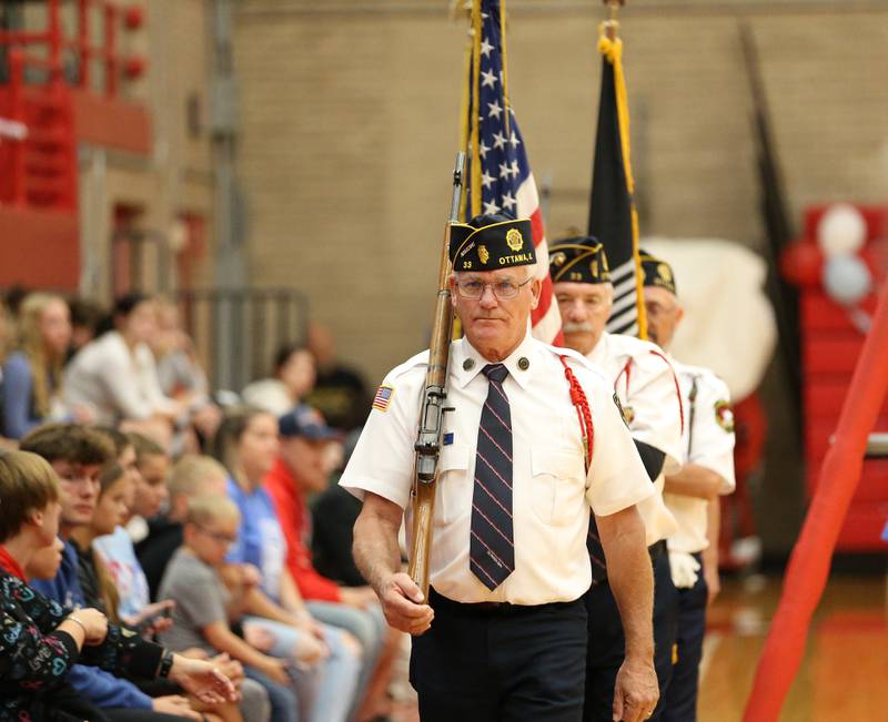 Ottawa American Legion Post 33 Veterans present the colors before volleyball game against Sycamore on Thursday, Oct. 12, 2023 at Kingman Gym.