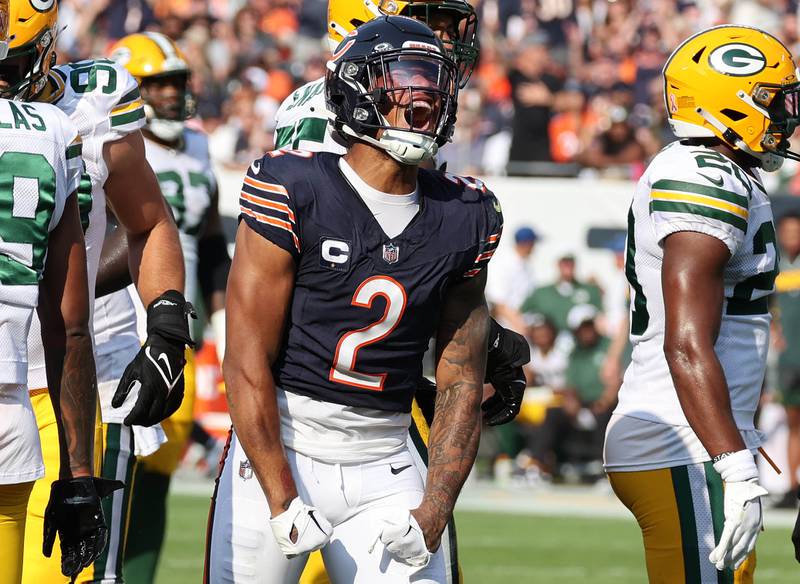 Chicago Bears wide receiver DJ Moore celebrates after catching a pass for a key first down during their game against the Green Bay Packers Sunday, Sept. 10, 2023, at Soldier Field in Chicago.
