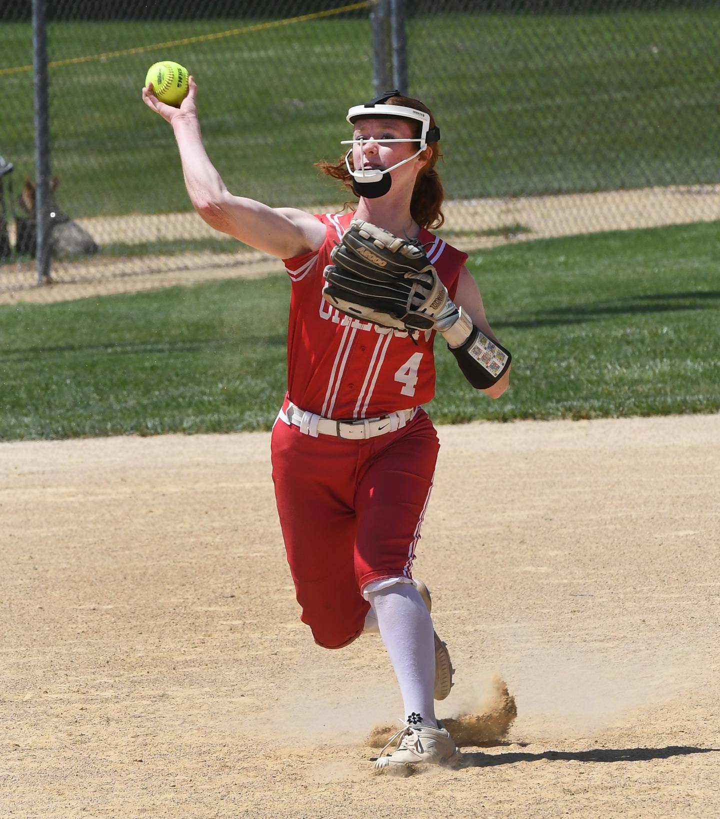 Oregon's Ashlee Mundell throws to first for an out during the championship game against Rock Falls at 2A Oregon Regional on Saturday, May 23, 2026 at Oregon Park West.
