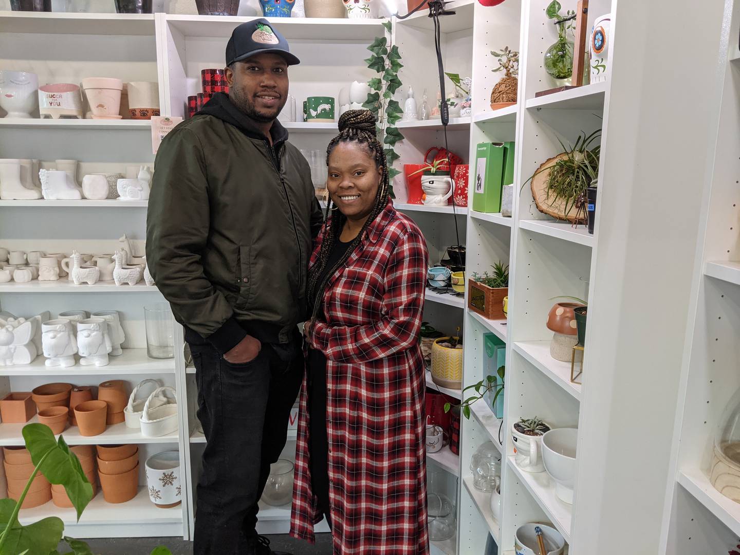 Husband and wife Quinton Young, left, and Markita Young, right, own Blooming Succulents Studio in Oswego.