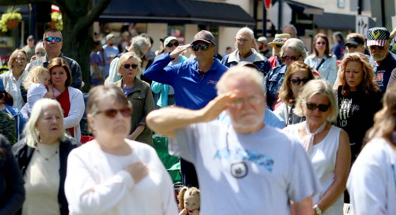 People crowd the square during a Memorial Day service and parade in downtown Woodstock on Monday, May 26, 2025.