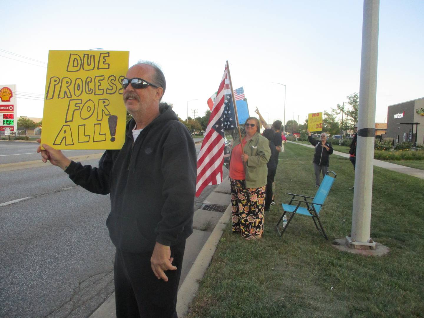 Bob Woods of Joliet holds a sign as he joined a protest Saturday in Joliet as the Trump Administration makes plans to send the National Guard into Chicago. Sept. 6, 2025