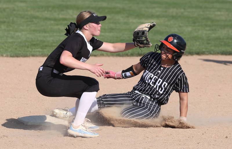 Crystal Lake Central's Ella Arana steals second as Prairie Ridge's Adysen Kiddy takes the throw Friday, June 6, 2025, during their Class 3A sectional final game at Sycamore High School.