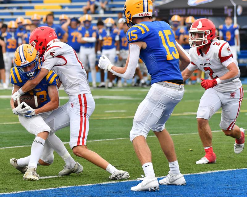 Lyons Township’s Lukas Sanguinet is denied the end zone by Hinsdale Central’s Charles Novatney after making a catch late in the game on September 20, 2025 at Lyons Township High School in LaGrange.