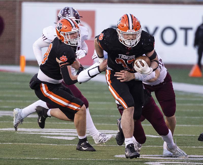 Byron’s Caden Considine runs for yards against Tolono-Unity Friday, Nov. 28, 2025, in the Class 3A football finals at Hancock Stadium at ISU.