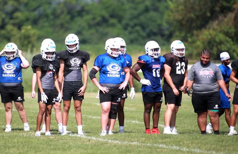 Glenbard South players during a joint practice with Sterling and Oswego East football teams on Tuesday, July 15, 2025 in Oswego.
