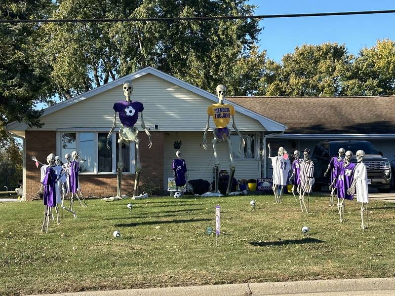 A home full of Mendota Trojan themed skeletons can be seen in the 100 block of US. Route 52 near Mendota High School on Sunday, Oct. 20, 2024 in Mendota.