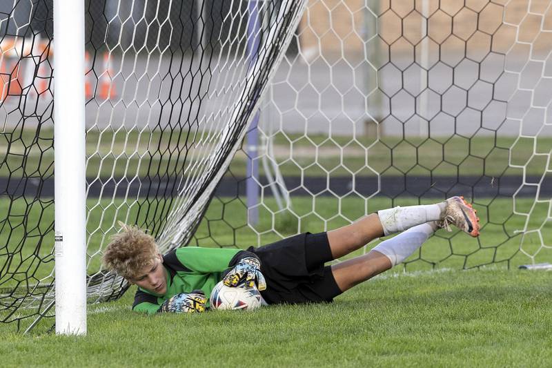 Winnebago goals Noah Melin stretches to make the stop Thursday, Sept. 26, 2024, at Dixon High School.