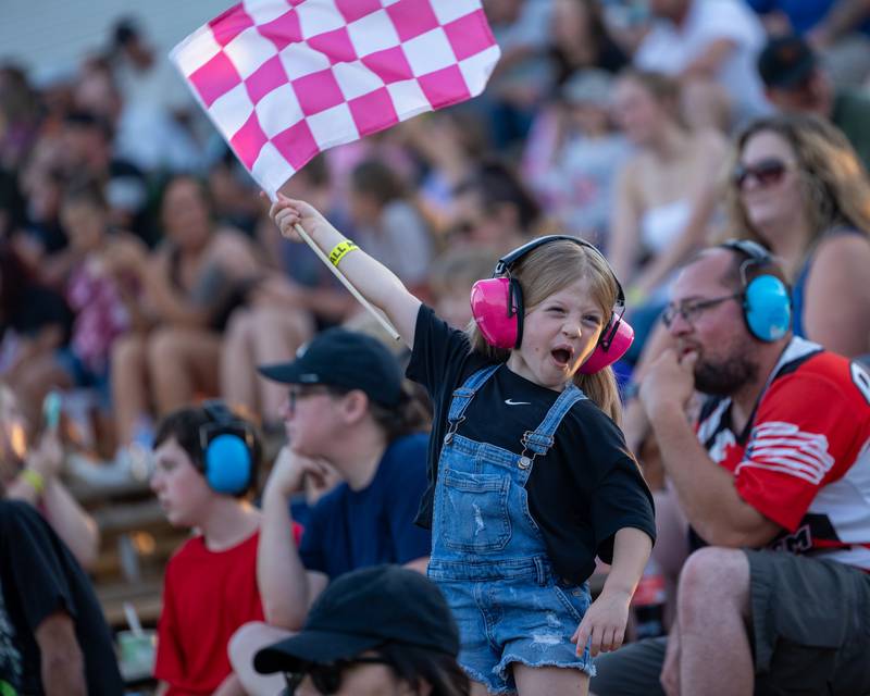 Ava Janick celebrates the commencement of the Monster Truck Bash show on Saturday, Sept. 13, 2025 at the La Salle Speedway in La Salle.