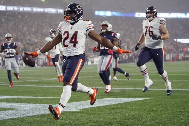 Chicago Bears running back Khalil Herbert celebrates his touchdown against the New England Patriots during the first half, Monday, Oct. 24, 2022, in Foxborough, Mass.