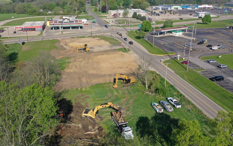 Crews excavate a lot for a future Aldi store on the corner of North Main Street and Backbone Road on Tuesday, May 6, 2025. Aldi broke ground last week. The timeline is to have the store open by Thanksgiving this year.