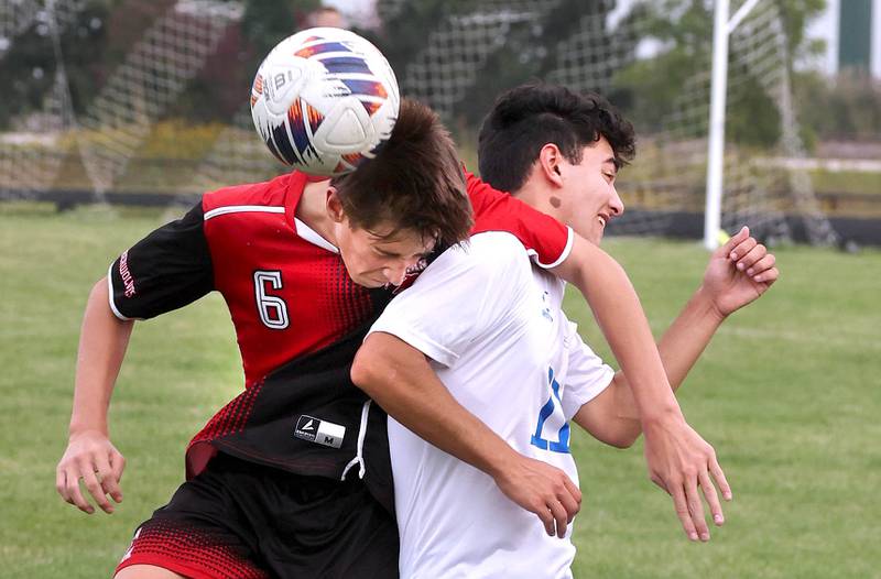 Indian Creek's Jason Brewer and Hinckley-Big Rock's Josh Badal go for a header during their game Wednesday, Sept. 20, 2023, at Pack Park in Waterman.