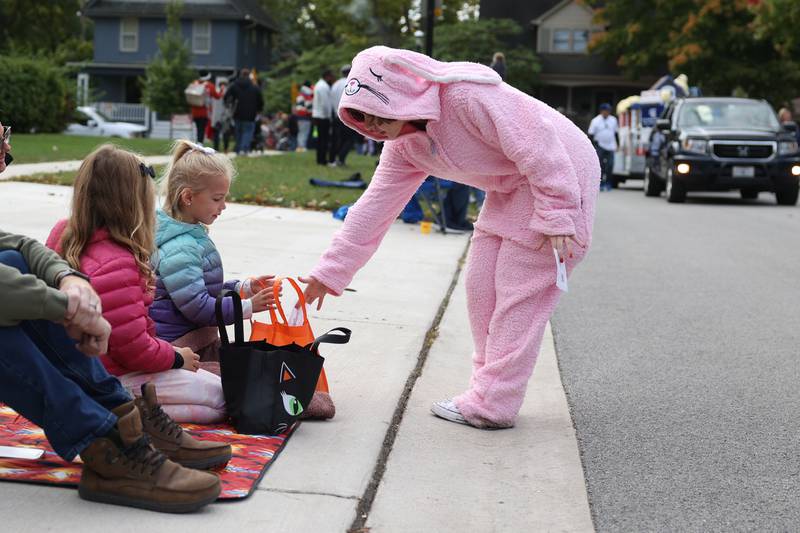 Plainfield Central student dress as a “deranged Easter bunny” hands out tickets to their upcoming Christmas Story plat to the crowds in the 70th Annual Plainfield Homecoming Parade. Saturday, Oct. 8, 2022, in Plainfield.