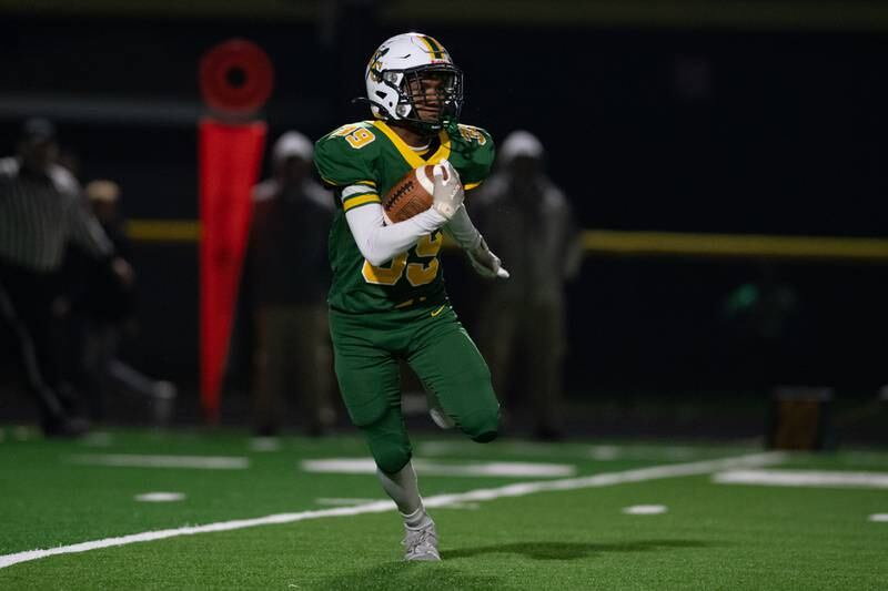 Coal City's Rey Gonzalez runs the ball during the first round IHSA class 4A playoffs against Johnsburg on Friday Nov. 1, 2024 at Coal City High School