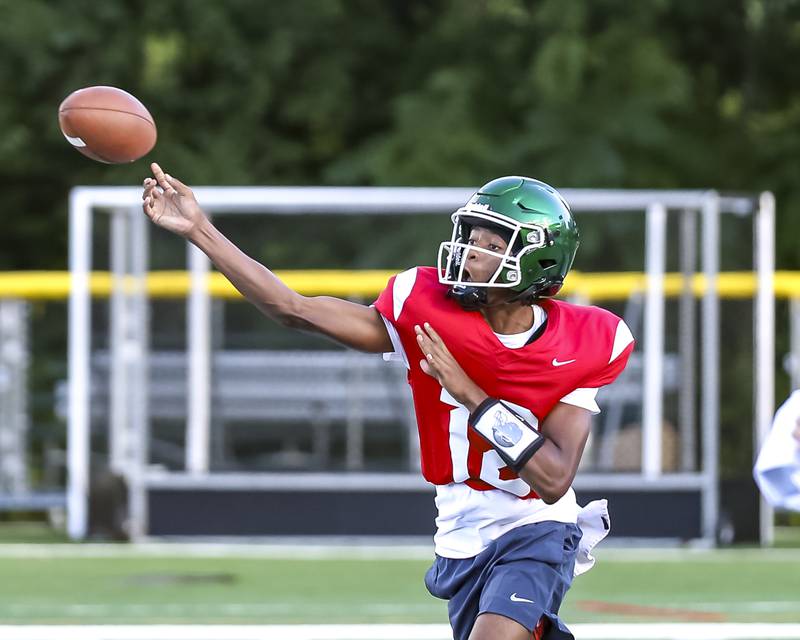AJ Rayford throws a pass at Glenbard West football practice, Wednesday, Aug 21, 2025  in Glen Ellyn.