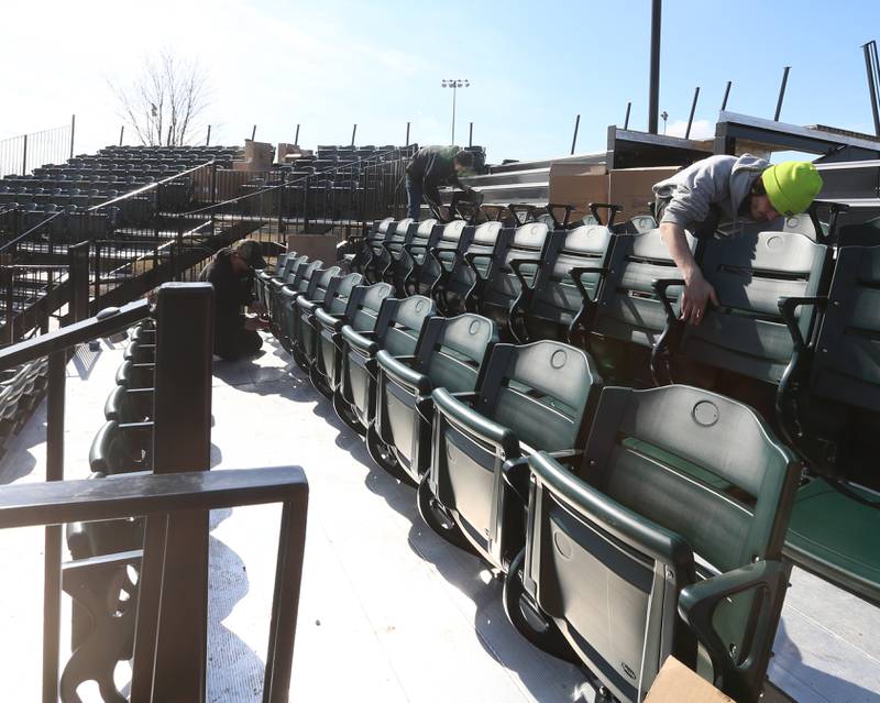Workers from Hayden Construction installed box seats at Schweickert Stadium on Monday, March 6, 2023 in Peru. The stadium home of the Pistol Shrimp grandstand was approved by the Peru City Council last June. This phase included 575 box seats, a new grandstand and press box.