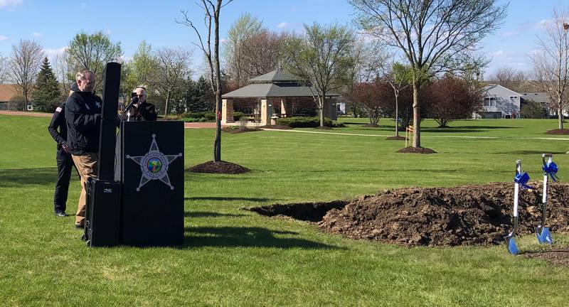 Lake in the Hills police chaplain Mark Wood approaches the podium at the Lake in the Hills police station groundbreaking April 19, 2024.