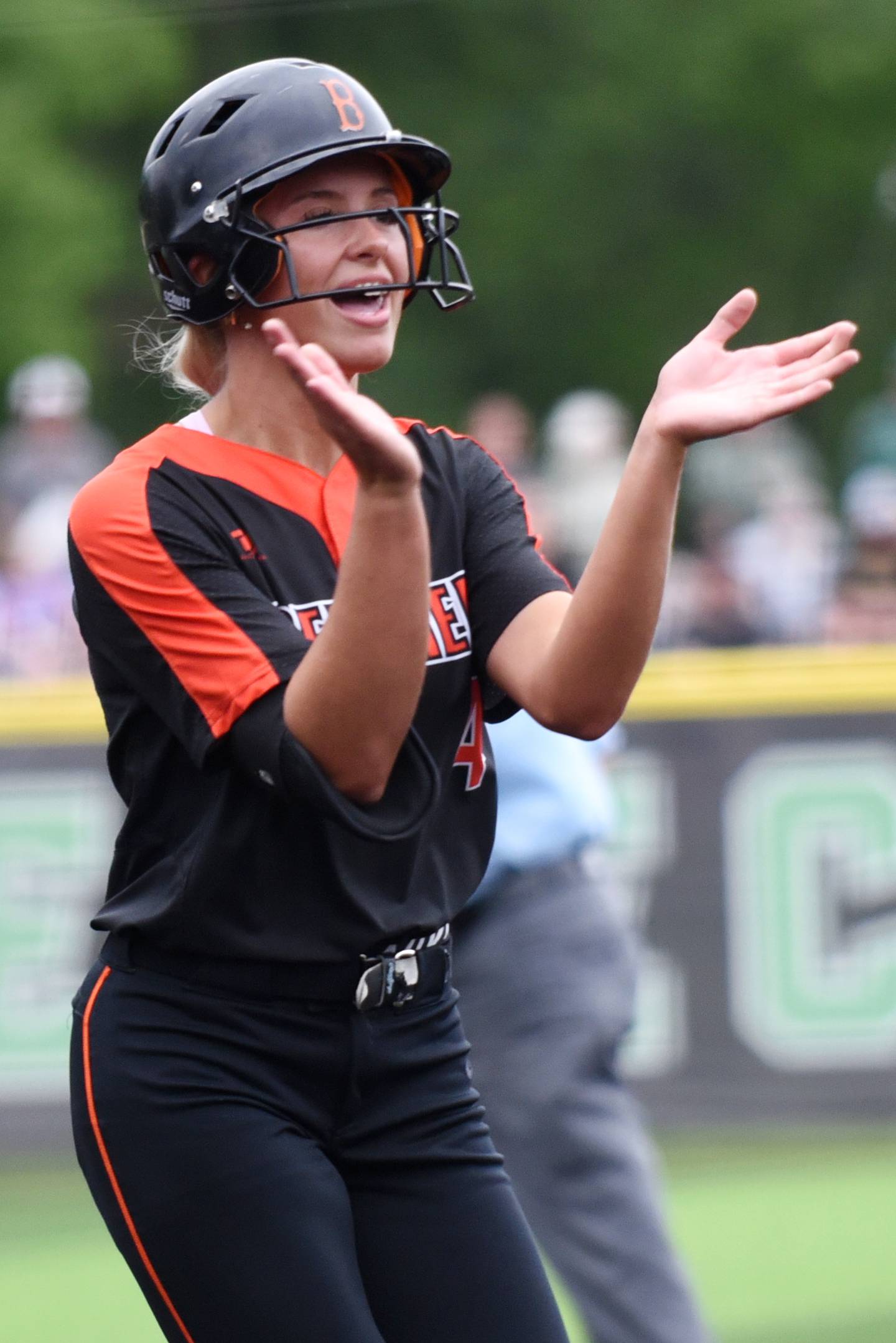 Beecher's Ava Lorenzatti claps as she reaches home plate following her solo home run for the only run of the game in the Bobcats' 1-0 win over Seneca in the Class 2A Seneca Sectional championship Friday, May 30, 2025.