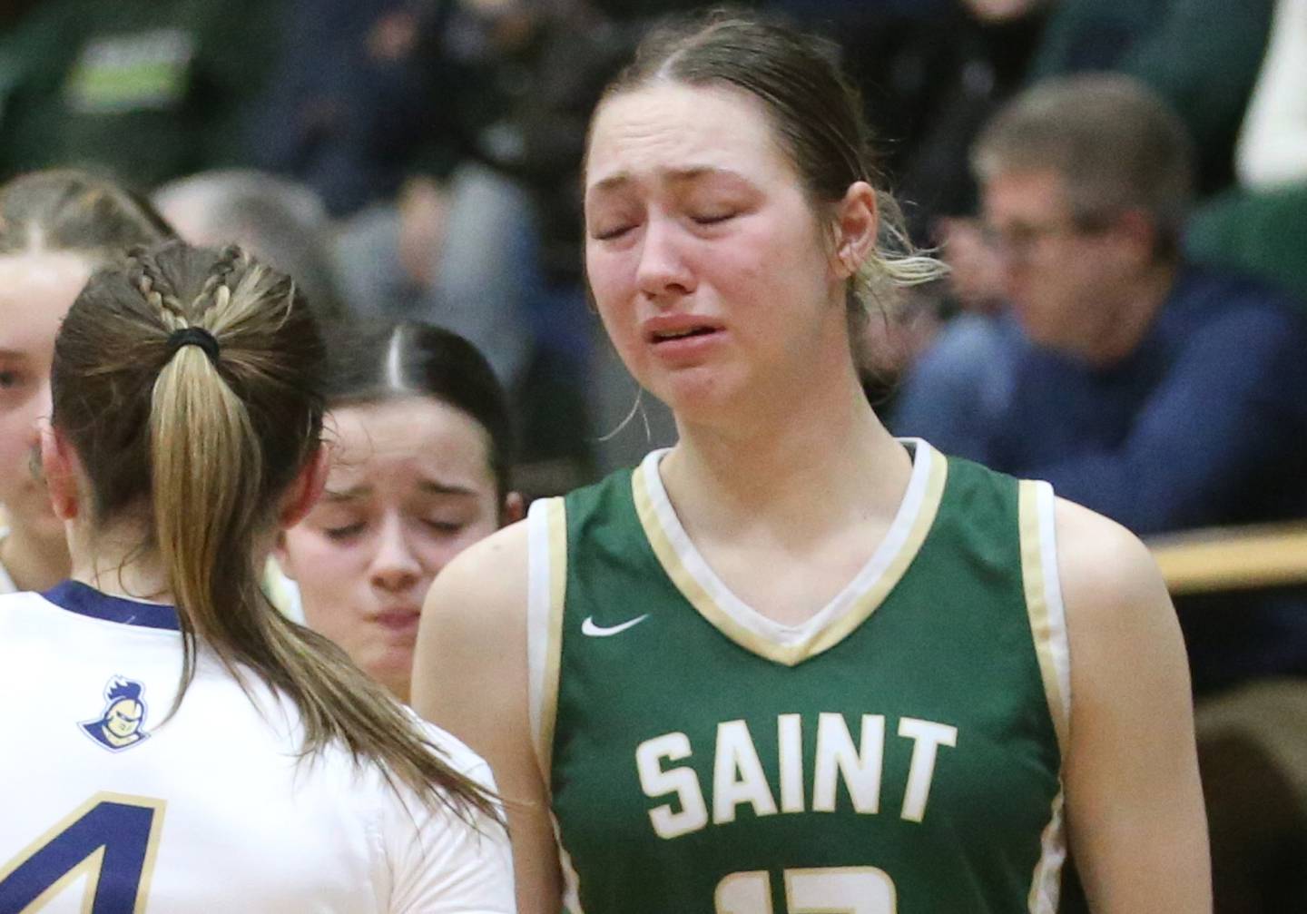St. Bede's Ashlyn Ehm reacts after loosing to Marquette during the Class 1A Regional semifinal game on Tuesday, Feb. 18, 2025 at St. Bede Academy.