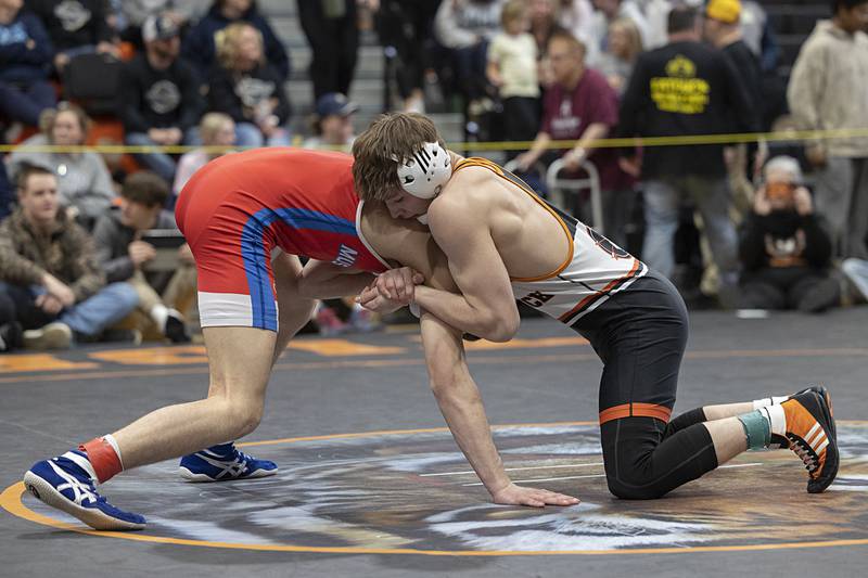 Sandwich’s Cooper Corder controls Morrison’s Caleb Modglin in the 150 pound first place match Saturday, Feb. 14, 2026, during the Class 1A wrestling sectionals in Byron.