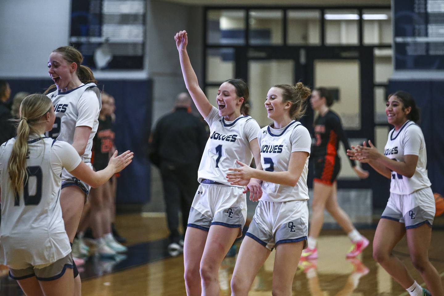 Oswego East runs off the court after winning their game against Minooka Friday, Jan 16, 2026 in Oswego.