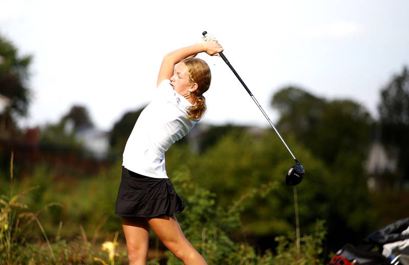 Wheaton Warrenville South’s Brooklyn Calabrese tees off during the Class 2A Waubonsie Valley Girls Golf Sectional on Monday, Oct. 6, 2025 at Springbrook Golf Course in Naperville.
