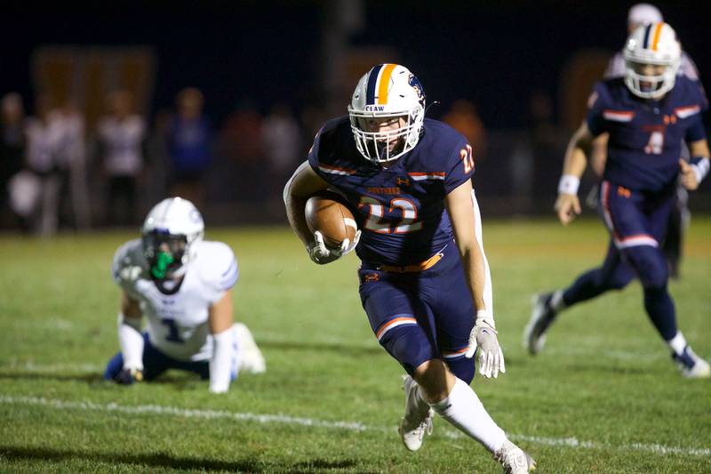 Oswego's Graham Schwab carries the ball for a gain against Geneva on Friday, Sept. 5, 2025 in Oswego.
