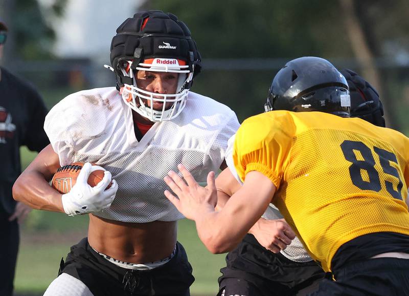 Lena-Winslow and Byron scrimmage Thursday, July 24, 2025, during a joint practice with Byron, Lena-Winslow and Sycamore at Sycamore High School.