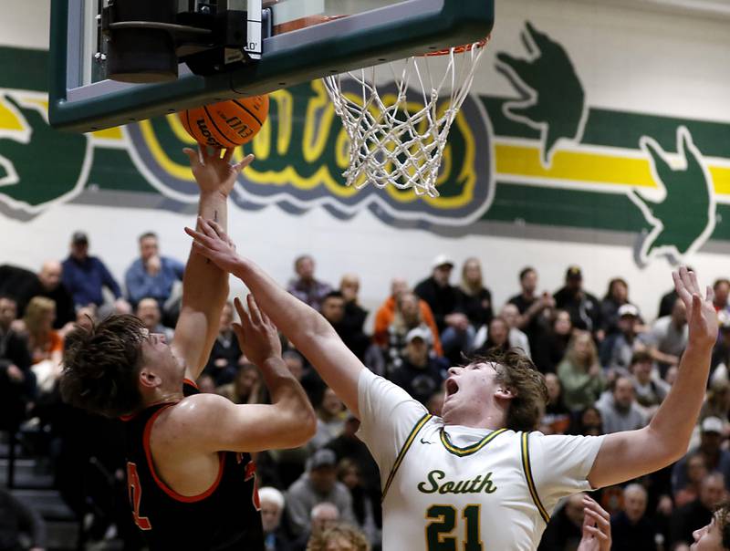 McHenry's Conner McLean shots the ball in front of Crystal Lake South's Ryan Morgan during a Fox Valley Conference basketball game on Friday, Jan. 31, 2025, at Crystal Lake South High School.