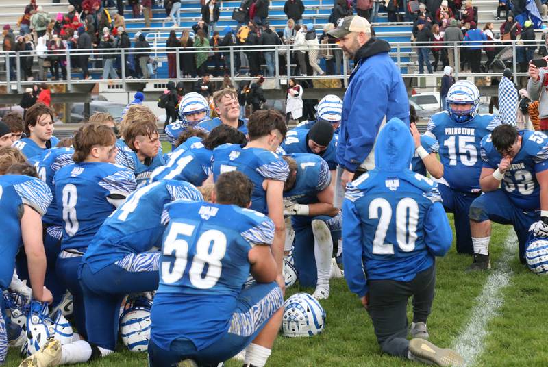 Princeton head football coach Ryan Pearson talks to his players after loosing to Montini Catholic during the Class 3A quarterfinal game on Saturday, Nov. 16, 2024 at Bryant Field in Princeton.