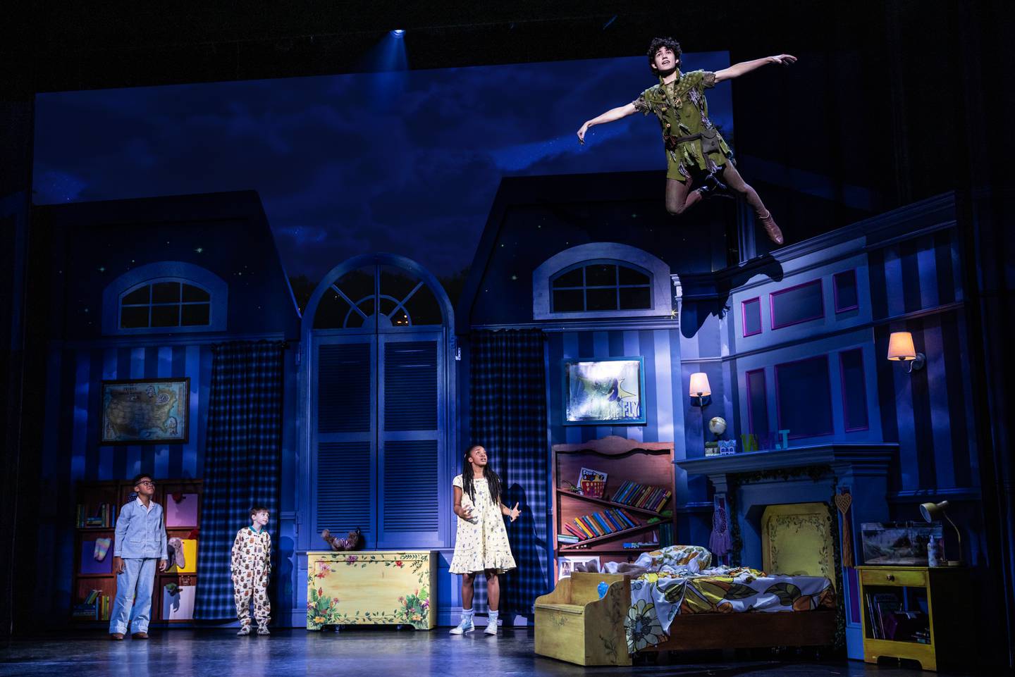 “I’m Flying.” (from L) Micah Turner Lee as John, Reed Epley as Michael, Hawa Kamara as Wendy, Nolan Almeida as Peter Pan. Photo: Matthew Murphy