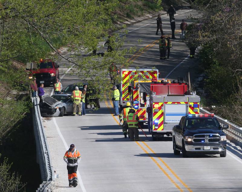 Tonica and Utica fire departments along with La Salle County Sheriff deputies, work the scene of a two-vehicle crash on the Illinois Route 178 bridge over the Vermilion River on Monday, April 22, 2024 near Lowell. The accident happened shortly before 8:30a.m. Both lanes of Illinois 178 were temporarily shut down while emergency crews assisted at the scene.