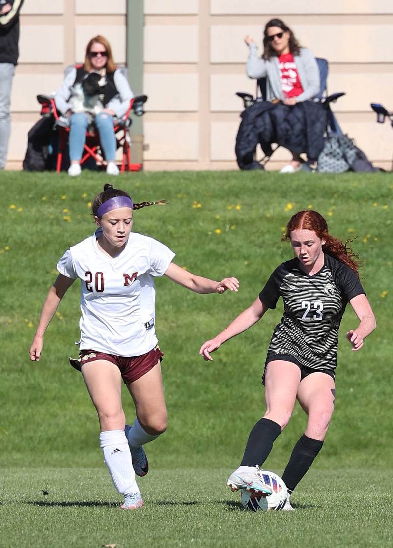 Sycamore's Izzie Segreti tries to keep the ball away from Morris' Nicolette Boelman during their Interstate 8 Conference Tournament semifinal game Wednesday, May 3, 2023, at Sycamore High School.