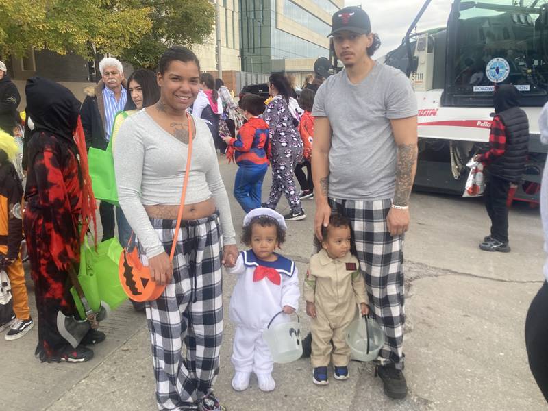 Parents David and Molina and Sarah Watson pose with their sons Ayden and John in Ghostbusters themed outfits. 
Saturday, Oct. 25, 2025.