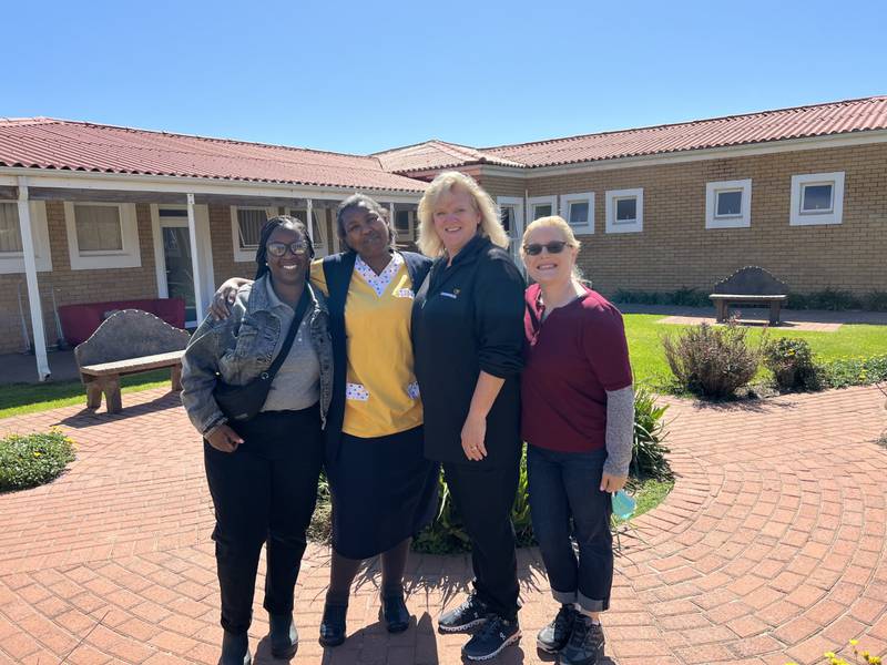 Lisa LeBeau poses for a photo during a service trip with Compassus and Living Hope to South Africa.