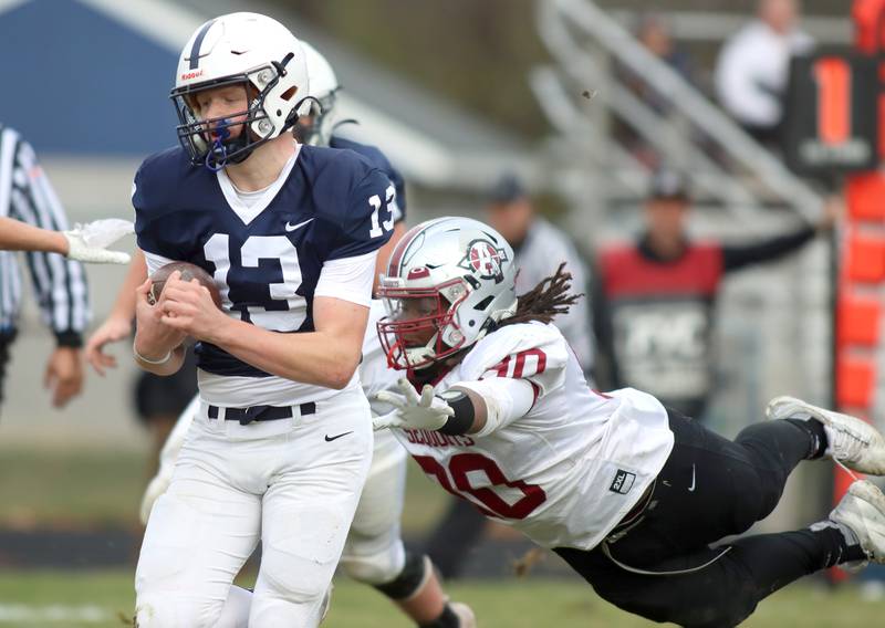 Cary-Grove’s Jackson Berndt sprints on a touchdown run against Antioch in IHSA Class 6A second-round playoff football action on Saturday, Nov. 9, 2024, at Al Bohrer Field on the campus of Cary-Grove High School in Cary..