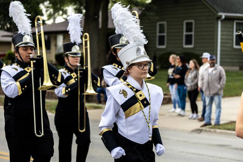 Drum major Cara Konieczny leads the Marching Tigers down Glenwood Ave. in Joliet during the Joliet West homecoming parade on Oct. 10, 2025.