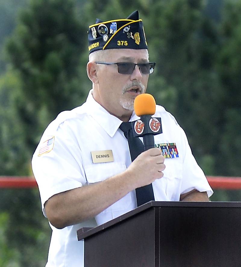 Dennis Znaniecki, of Peru American Legion Post 375, speaks during the ceremony Saturday, Aug. 26, 2023, at Veterans Memorial Park in Peru as the community remembered those who died in the Vietnam Conflict with a visit from the Vietnam Traveling Memorial Wall, which was on put on display in Peru.