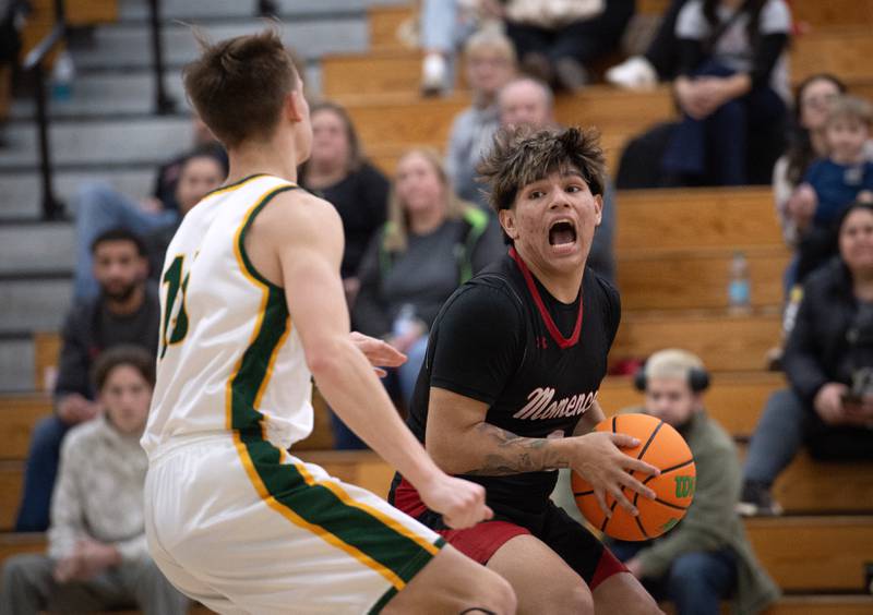 Momence's Erick Castillo, right, makes a break toward the net as Grant Park's Ian Hamann guards in a game on Friday, January 16, 2026.