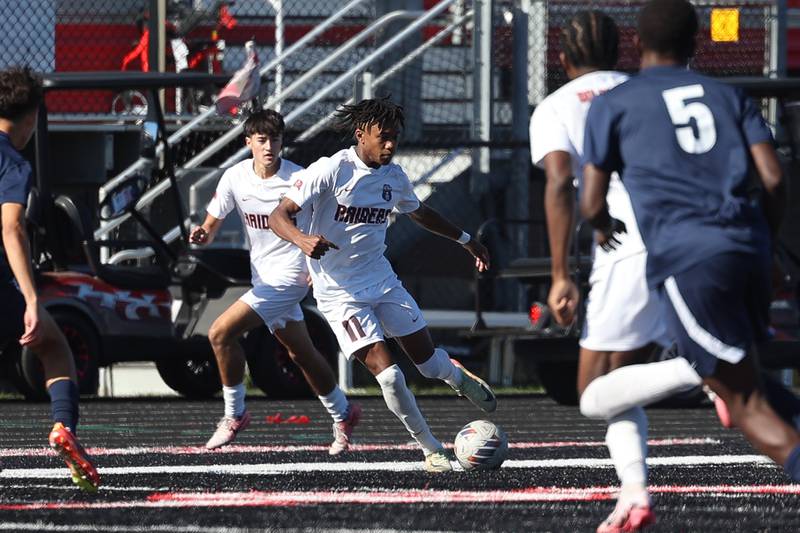 Bolingbrook’s Chase Beals looks to pass against West Aurora in the Class 3A Bolingbrook Regional championship match on Saturday, Oct. 26, 2024 in Bolingbrook.