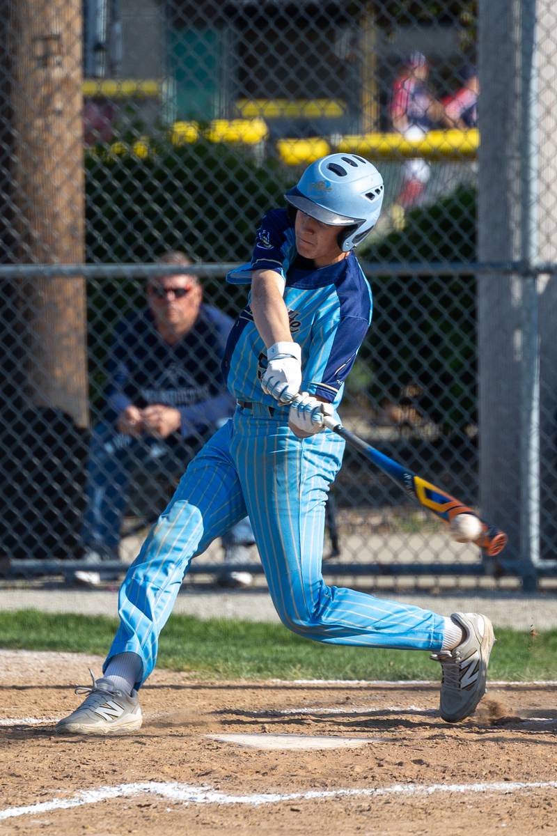 Caden Durdan (5) of Marquette hits ball on Thursday, May 8, 2025 at Masinelli Field in Ottawa.