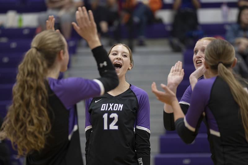 Dixon’s Isabelle Quackboerner celebrates a point against L-P Tuesday, Oct. 29, 2024, at the class 3A regional semifinal in Dixon.