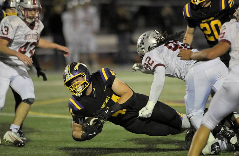 Wauconda’s Jackson Rudolph falls for a first-dowen against Antioch in a football game in Wauconda on Friday, Oct. 17, 2025.