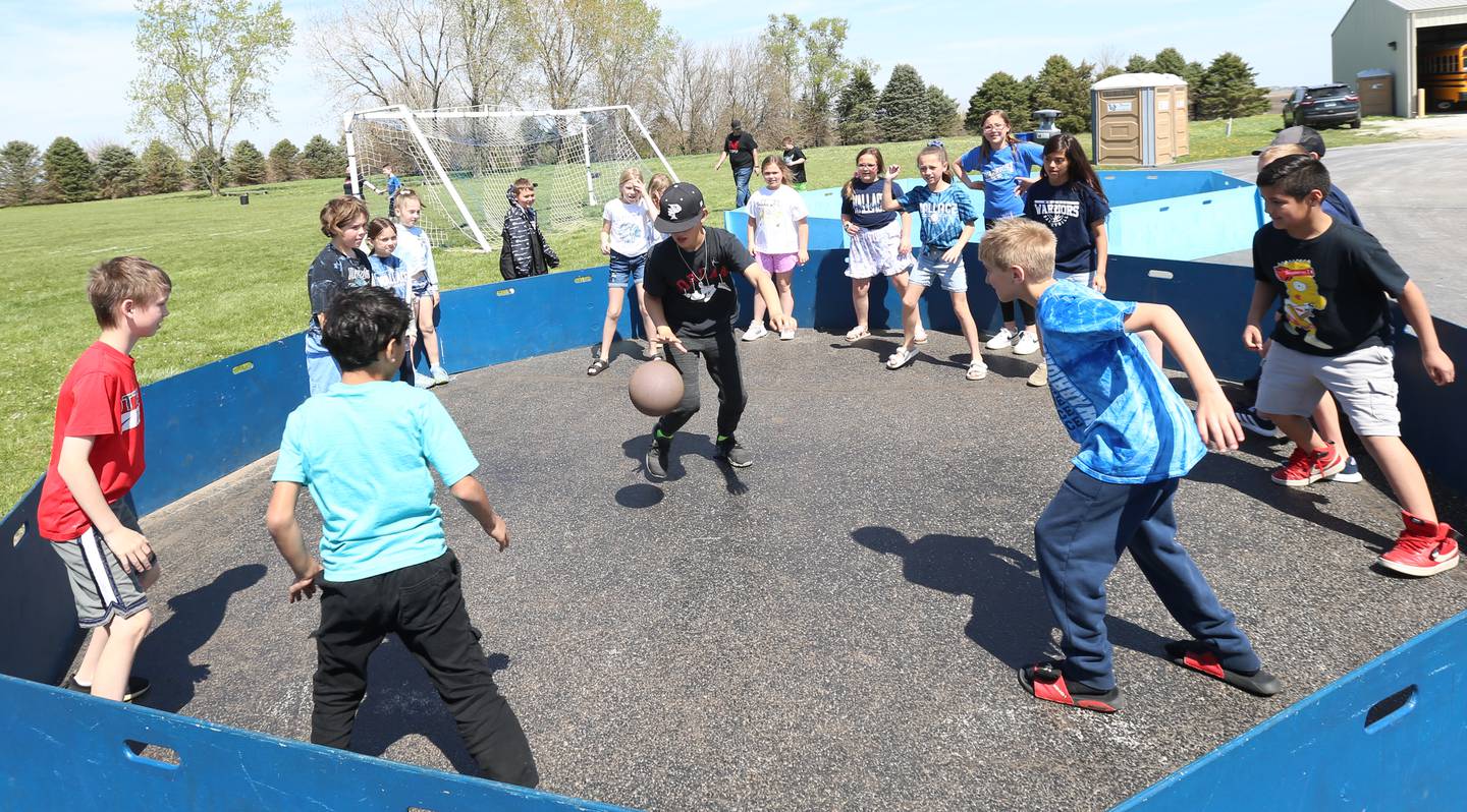 Wallace Grade School students play "GaGa Ball" during the "Warrior Games" on Friday, May 5, 2023 at Wallace Grade School. Gaga is a variant of dodgeball that is played in a pit area.