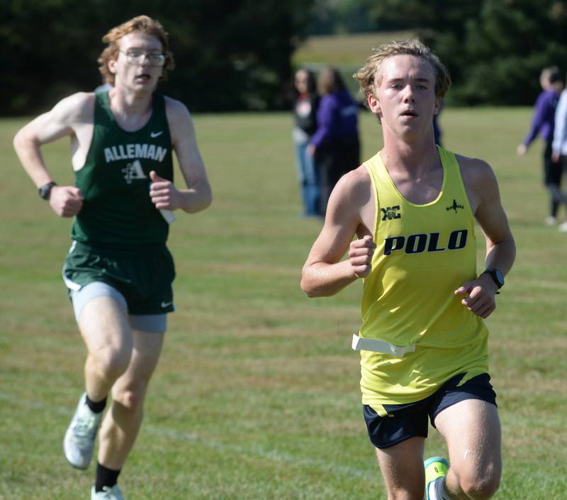 Polo-Forreston's Landon Graden (right) heads to the finish line of the Oregon Cross Country Open on Saturday, Sept. 6, 2025 at Oregon Park West. He finished 55th.