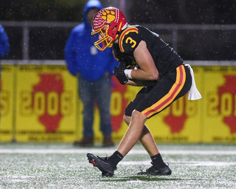 Batavia's Thomas Prescott (3) catches a pass and gains some yards before being brought down by Hoffman Estate during the first round of playoffs on Friday Oct. 31, 2025, held at Batavia High School.