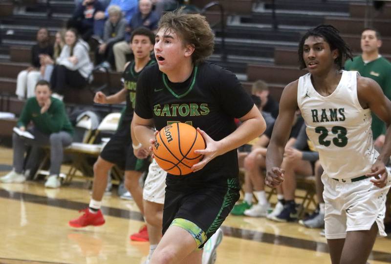 Crystal Lake South’s Ryan Morgan moves the ball against Grayslake Central during Hinkle Holiday Classic varsity boys basketball tournament action on Thursday, Dec. 26, 2024 at Jacobs High School in Algonquin.